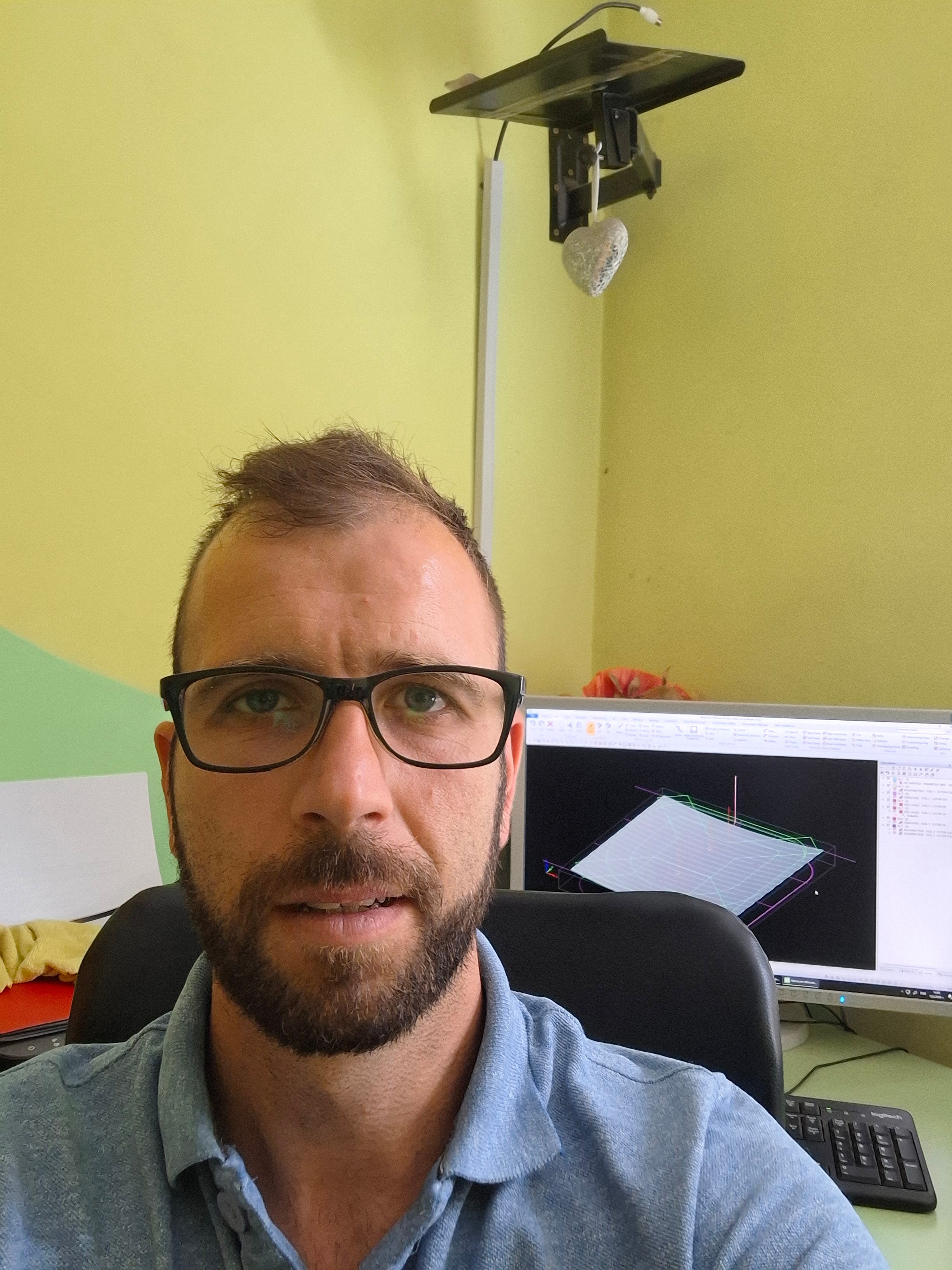 Georgi, founder of BFW, at his workstation with CNC design software open, the person behind Creator Lab