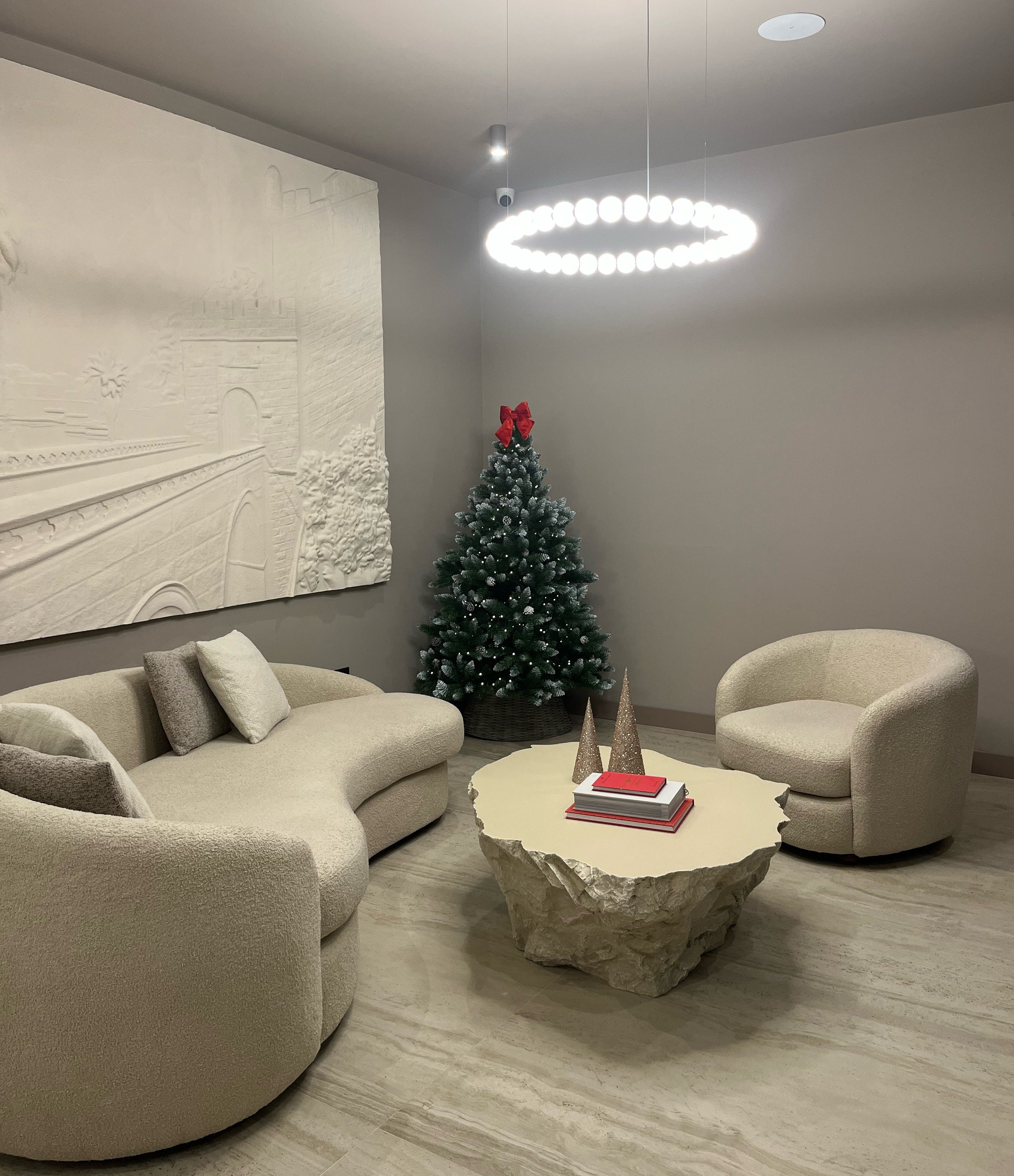 Large-scale 3D relief wall panel of Dubrovnik castle cityscape in a luxury lounge interior, white painted finish