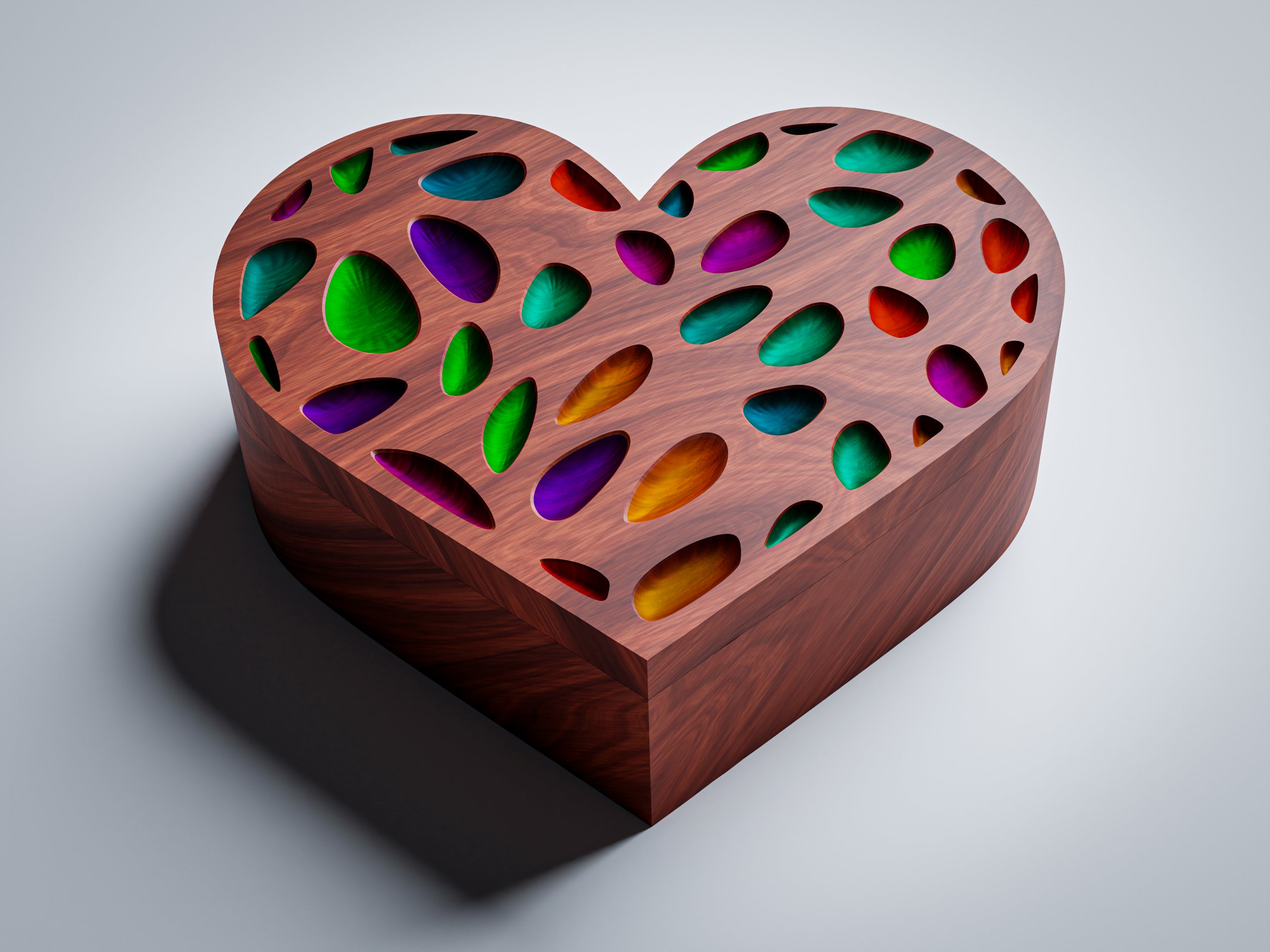 JB5 heart jewelry box CNC files, wood finish render, front-angle view showing perforated lid with multicolor epoxy fill through oval and teardrop cutouts
