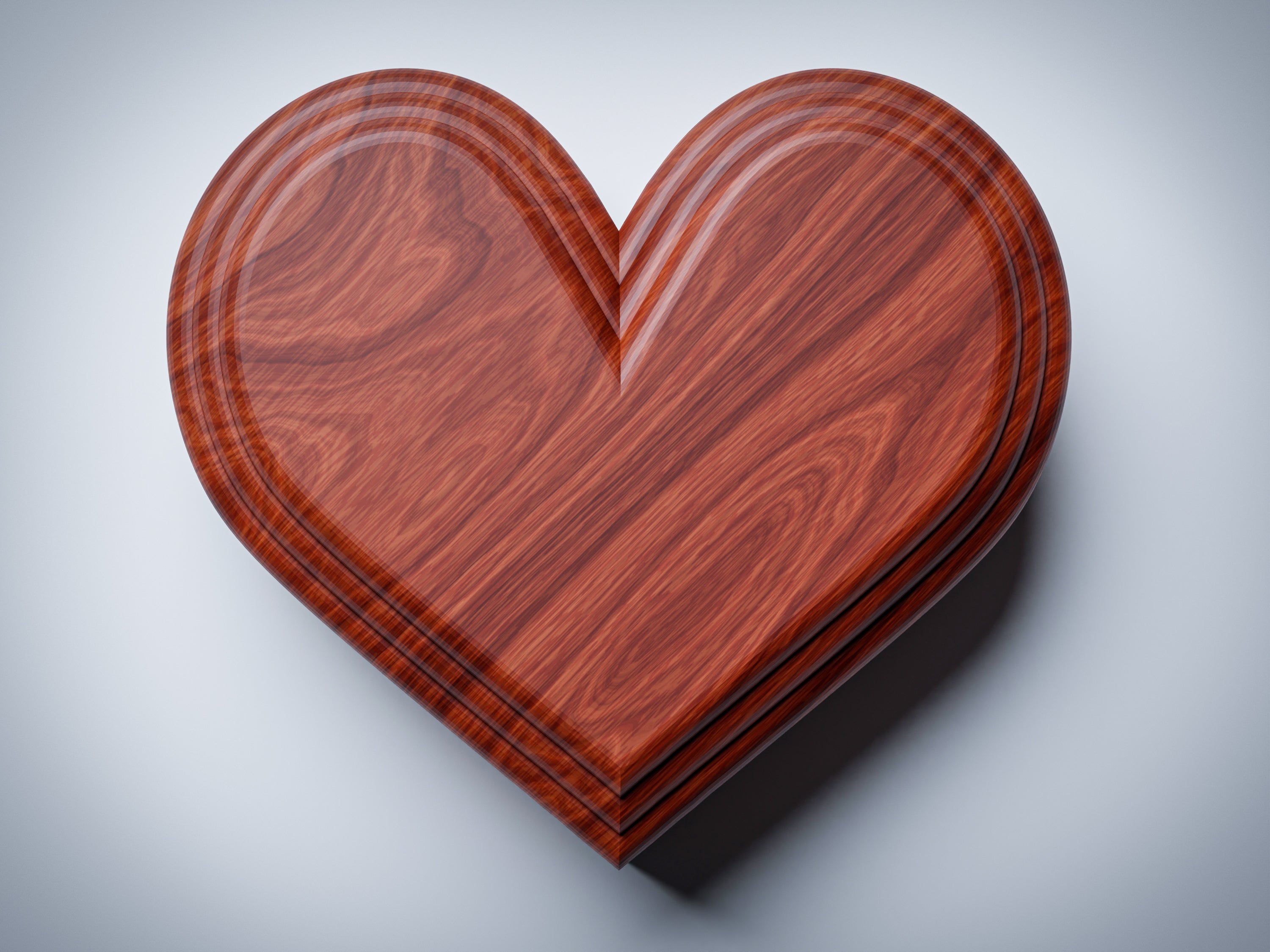 B1 heart jewelry box CNC files, wood finish render, top-down view showing heart shape and concentric stepped lid ridges
