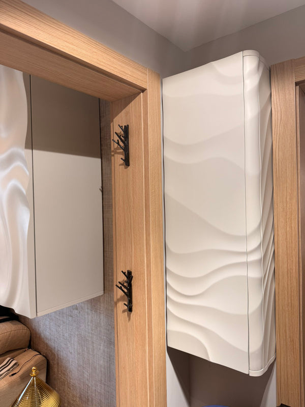 Wave panel design wrapping continuously from cabinet door face to adjacent side panel across the corner angle, modified BFW WP5 design, custom furniture application