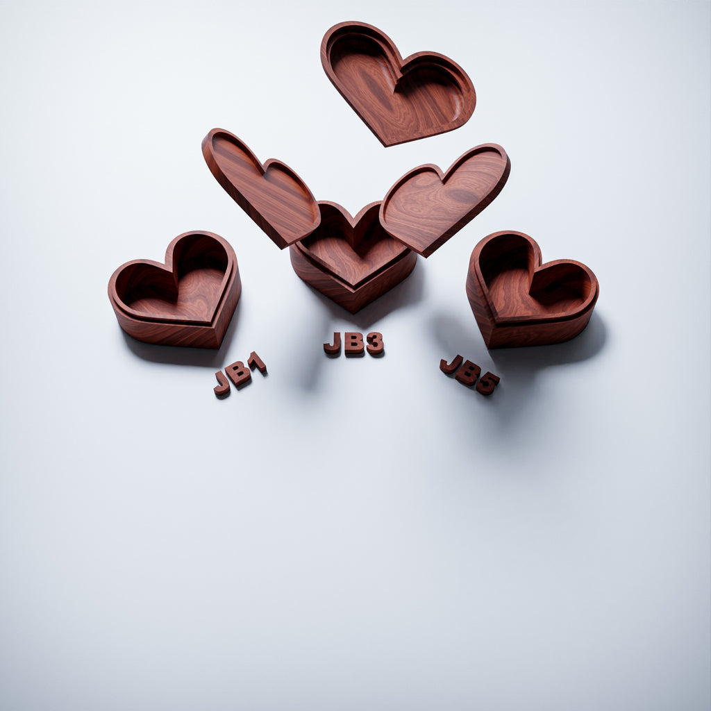 three heart shaped jewelry boxes are moving closer together and showcasing interchangable lids. BFW design